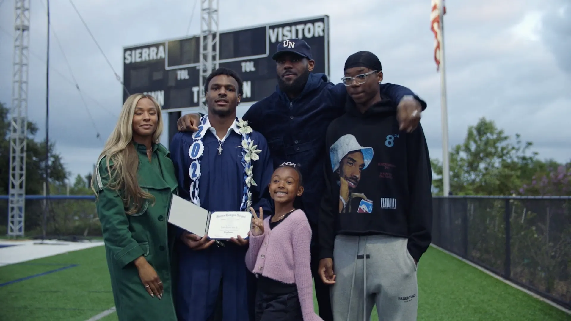 Bronny James with family at graduation.